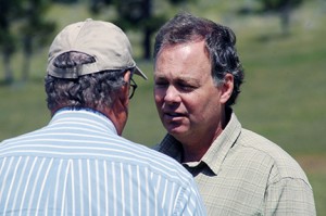 Norm Macdonald speaks with Forests Minister Steve Thomsen last summer during a Lot 48 celebration at Fairmont.