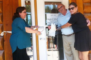 Mayor Ute Juras, left, Coun. Paul Marcil and Ktunaxa Interpretive Centre and Garden manager Melanie Sam cut the ribbon Sept. 14. 