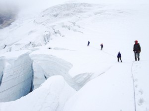 The CKCS team threads through crevasses on upper Robson glacier on their attempt on Mt Resplendent.  Photo by Max Darrah