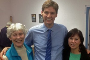 Past NDP candidate Norma Blissett (right) and former NDP MLA Anne Edwards welcome David Eby, newly elected MLA for Vancouver-Point Grey, to the annual general meeting of the Kootenay East NDP in Cranbrook on Sunday. Eby spoke and answered questions about how he defeated Christy Clark in the May election and what he is doing as the NDP's Critic for Advanced Education.