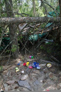 Above: In 2012 a 'squatter's village' near Grasmere, along the shore of Lake Koocanusa, was trashed and destroyed by unknown assailants. Ian Cobb/e-KNOW