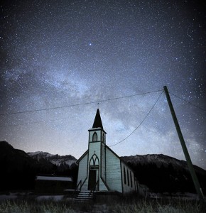 Sacred Heart Church is drawn up into the swarming Milky Way.