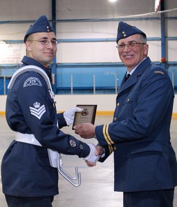Flight Sergeant Nathaniel Suwala receives the award for best senior cadet from Captain Murray Clow at the Elk Valley Air Cadets Annual Ceremonial Review. (Photo S.L. Furedi)