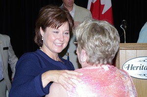 Premier Clark is greeted by Cranbrook and District Chamber of Commerce member Karin Penner.