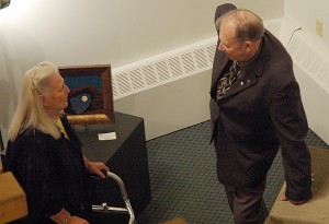 Jim Ogilvie speaks with a constituent at Centre 64 in 2010. Ian Cobb/e-KNOW