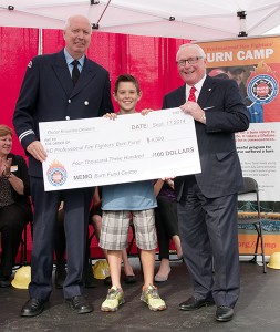 Oscar (Burn Survivor and Burn Camp Attendee) donating over 4600 dollars to the Burn Fund.  Proud of Oscar as he was one of my campers the first year I attended Burn Camp as a counselor.