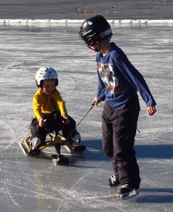 Youngsters enjoy the ice at the Nature Conservancy of Canada’s Winter Celebration on Marion Creek Benchlands on Sunday, December 14. Photo by NCC