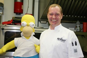 Chef Cox reveals his one secret tool allowed into the competition: A giant Homer doll.