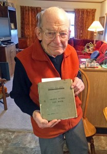 Bud Abbott with his pilots-log book. Photo by Elinor Florence