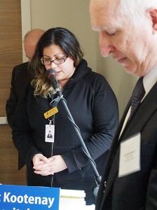 Debbie Whitehead opens the gathering as Interior Health CEO Chris Mazurkewich listens.