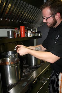 Chef Doug Wagner adds chocolate pudding to his chili