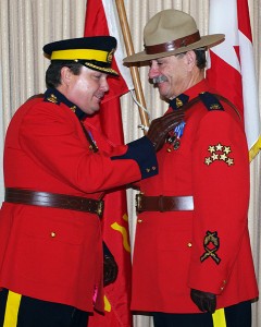 S/Sgt. Shehovac, right, receives a long service pin in 2012. 