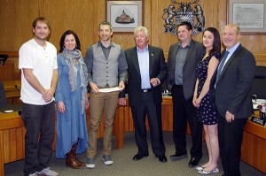 Tristen Chernove (third from left) accepts his award from Mayor Pratt (centre) and members of council for his accomplishments at the 2016 Para-Cycling Track World Championships. Ian Cobb/e-KNOW
