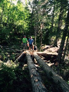 Pat Gilmar and Sean Staplin at the Montane Bridge span .