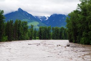 The Elk River filled with debris during the flood of 2013. e-KNOW file photo