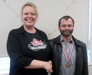 Marc Poirier, Terminal Manager Manitoulin Transport, right, with Sam Steele Society President Christy Wheeldon. Photos submitted