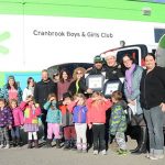 Businesses donate four 15-passenger vans to club