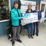 JCI presents parade donations to two local groups