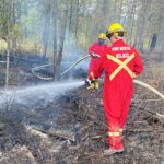 Firefighters respond to two spot fires next to Highway 3